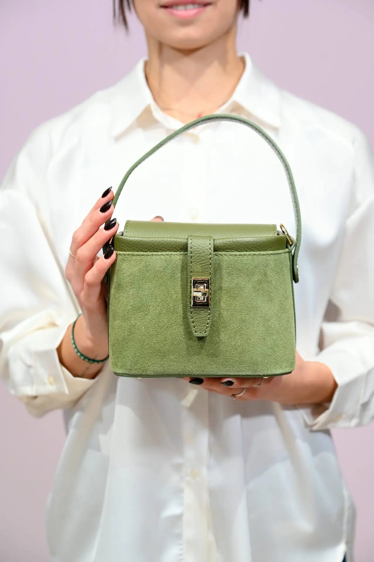 Borsa a mano verde in pelle scamosciata